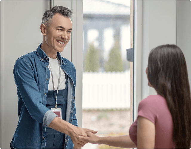 Happy tenant using laptop to access tenant portal